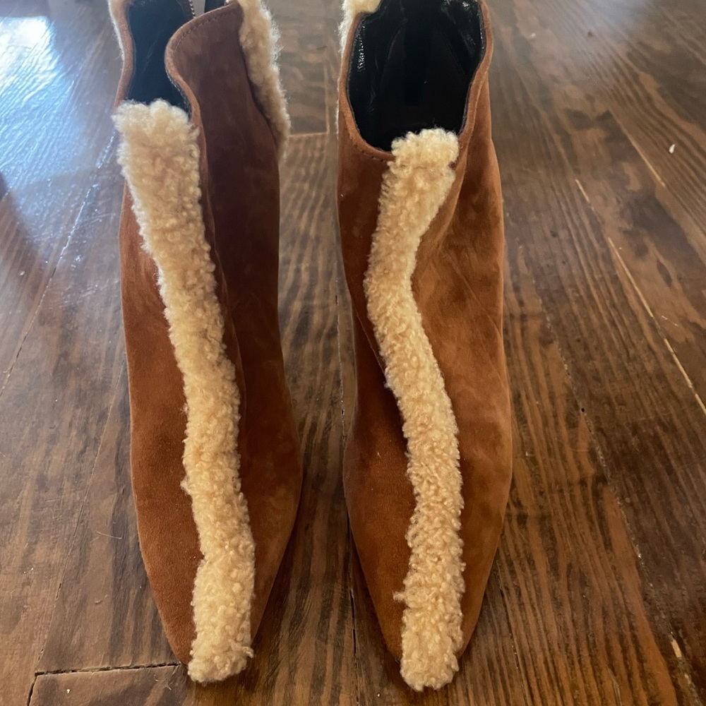 Brand new never worn Manolo suede and sheerling booties